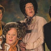 Four characters in old fashioned costumers to perform in Pride In Prejudice