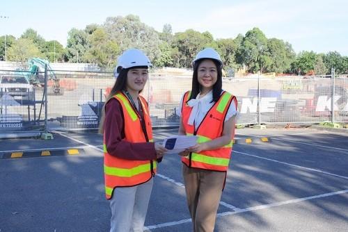 Former City of Whitehorse Mayor Cr Tina Liu (right) discusses works progress with Assistant Project Manager Danni Nguyen.