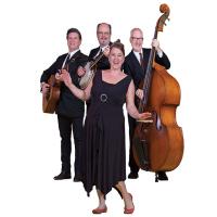 A old time folk band look happy. 