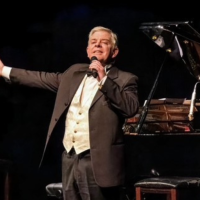 Tenor Roy Best singing on stage