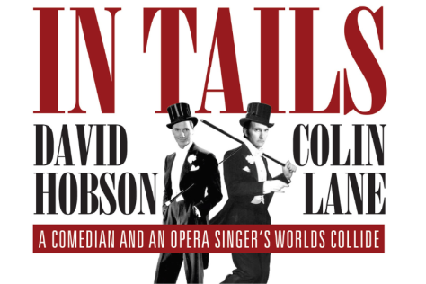 David Hobson and Colin Land stand back to back in top hat and tails.