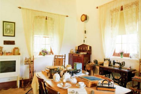 Interior scene of a pioneer cottage kitchen.