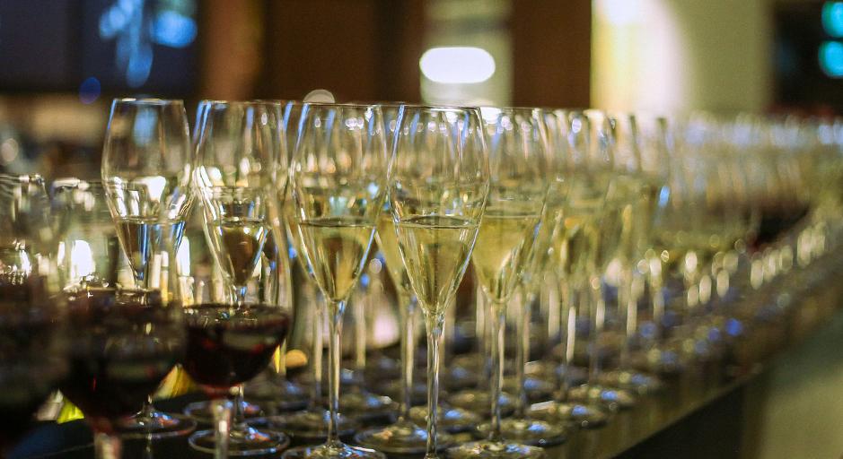 A row of wine glasses ready for serving