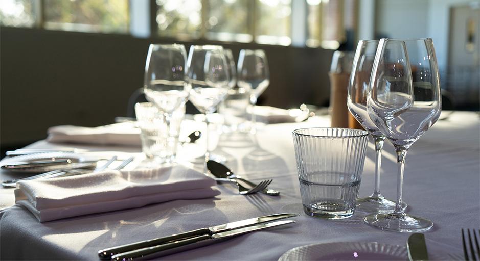 Table setting with cutlery and glassware