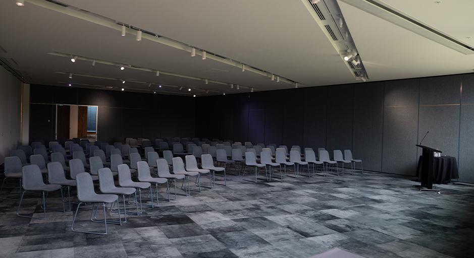 A view of the function room, with chairs lined up. 