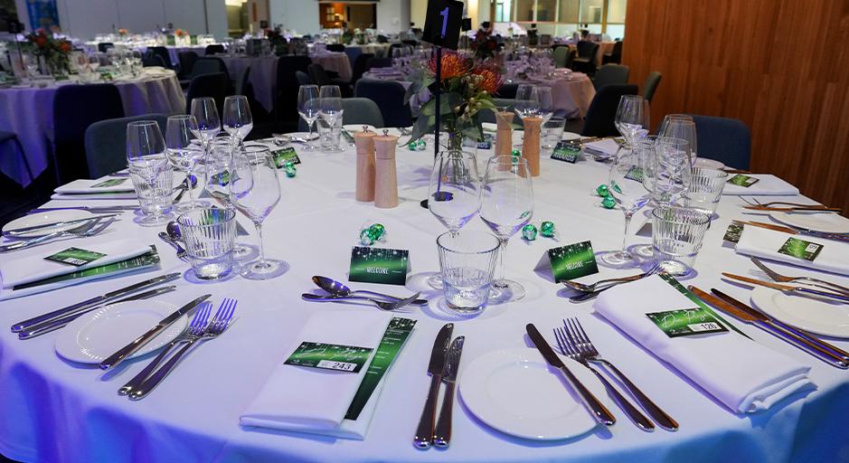 A table set up in a function room.