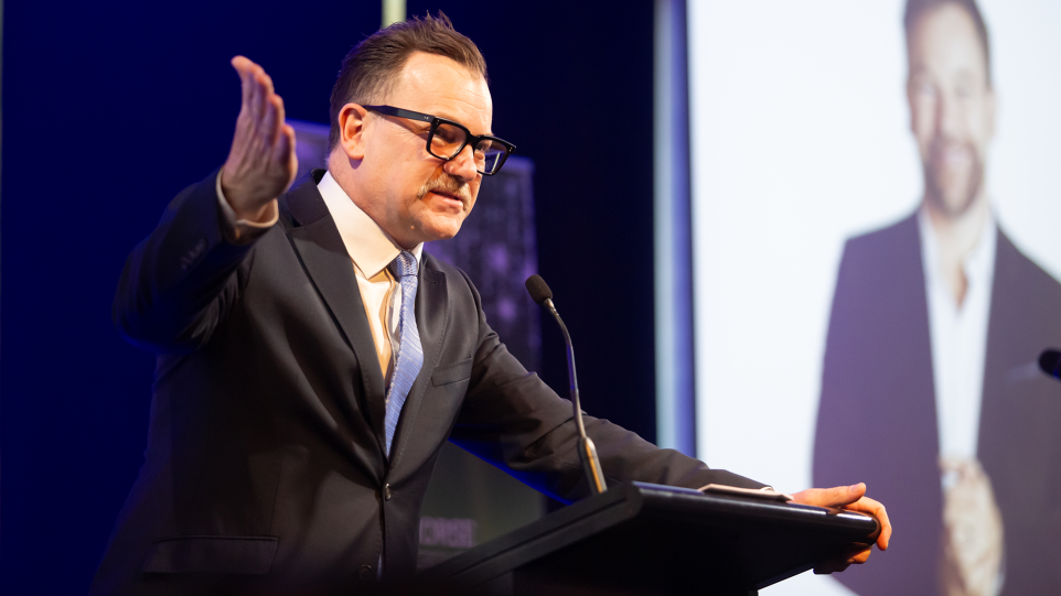 A man at a lectern