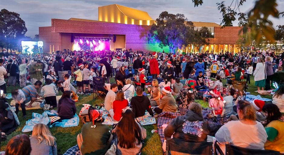 A large crowd attends the Whitehorse Carols event in 2023 using The Round soundshell