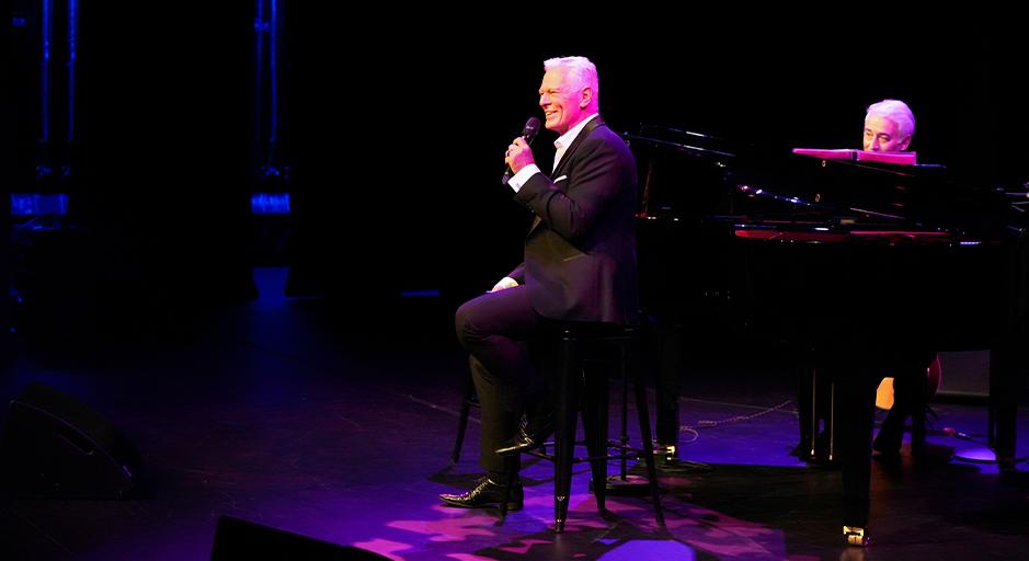 Michael Cormick sings on stage at The Round accompanied by David Cameron on piano.